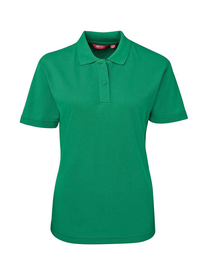 JB's Wear - Green short-sleeved women's polo shirt with a red tag.
