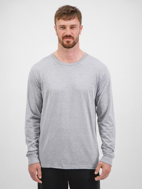 A man wearing a grey long-sleeve cotton crew neck t-shirt against a white background.