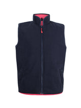 JB's Wear - Navy blue reversible vest with a pink lining and a red zipper pull.
